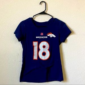 Used Broncos 18 Manning t-shirt.
